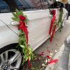 moflic_flowers_red_roses_on_car